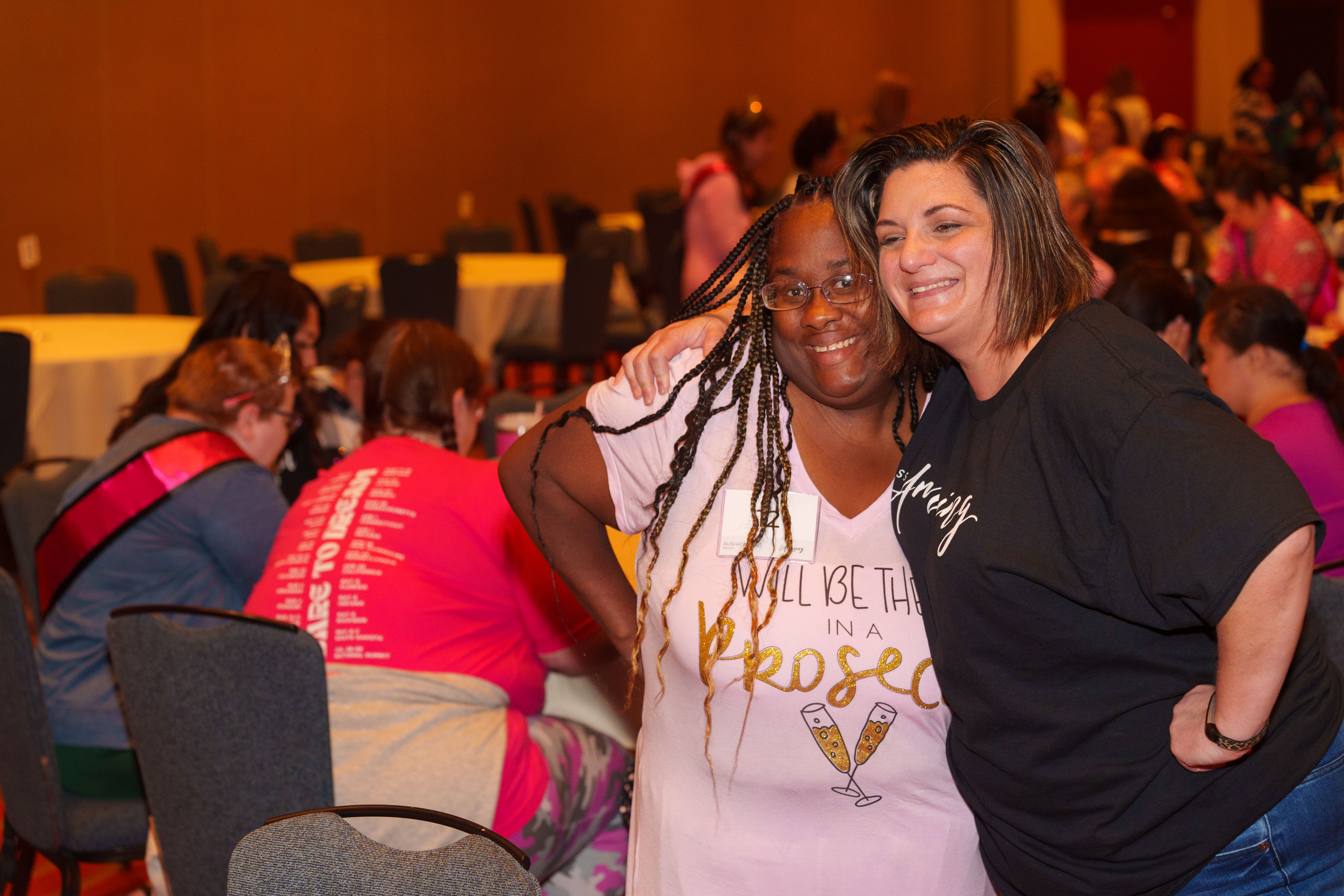 A participant and her buddy are hanging out while playing music bingo.